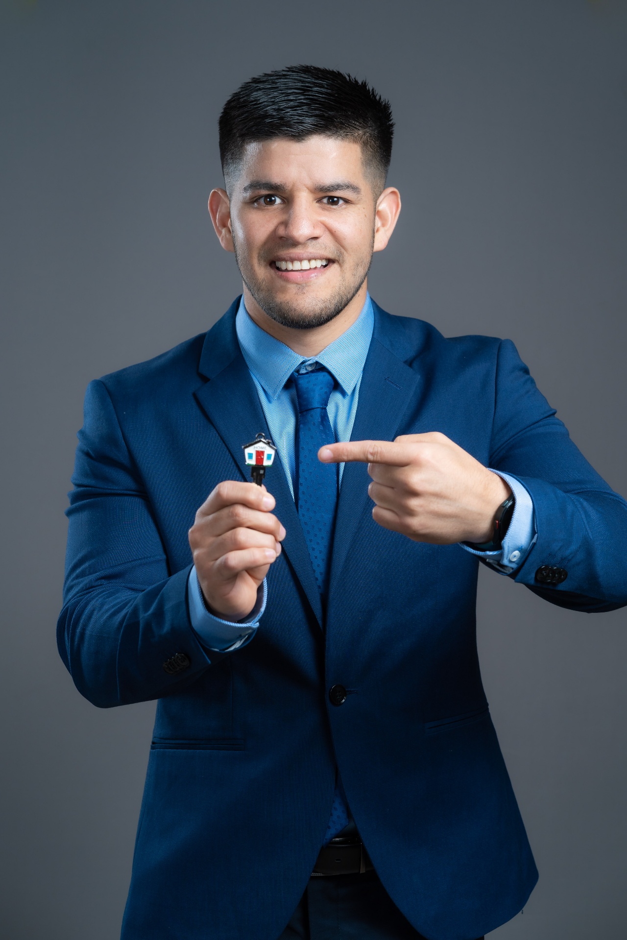 Jay Ramos holding a house key